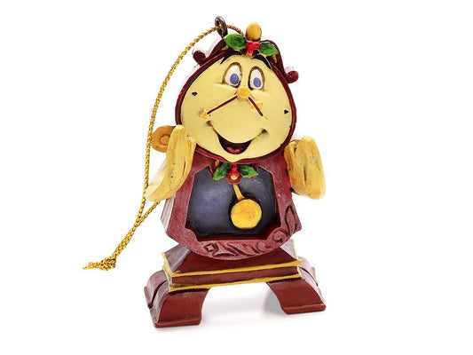 Voeg een vleugje Disney-magie toe aan je kerstversiering met het Cogsworth Jim Shore ornament.
