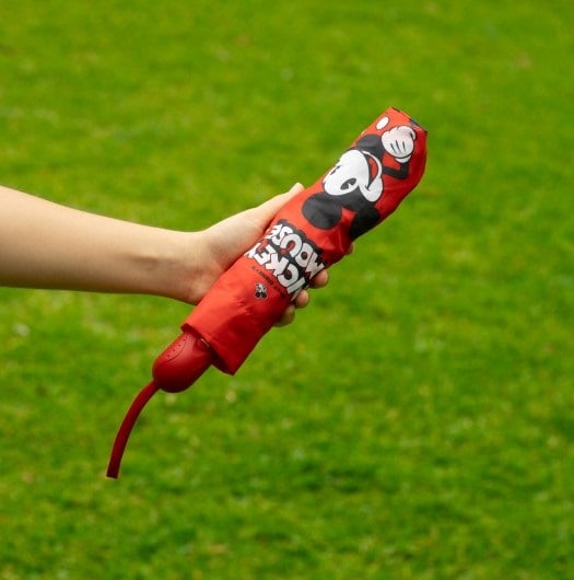"Officiële Disney Mickey Mouse paraplu – vrolijk design, compact opvouwbaar en duurzaam"