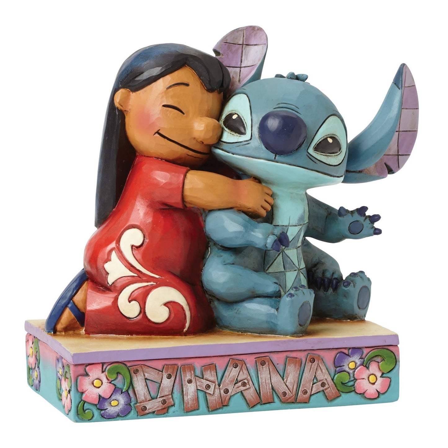 Handgeschilderd Lilo & Stitch-beeldje van Jim Shore uit de Disney Traditions-collectie, gemaakt van gegoten steen en geleverd in luxe geschenkdoos.