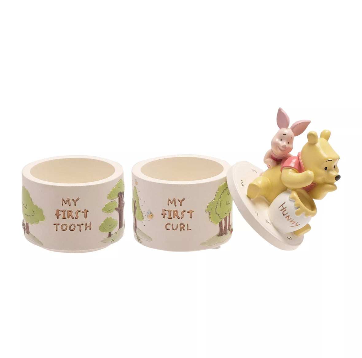 Winnie de Poeh tand- en krullen-sieradendoosjes set verpakt in een elegante geschenkverpakking.