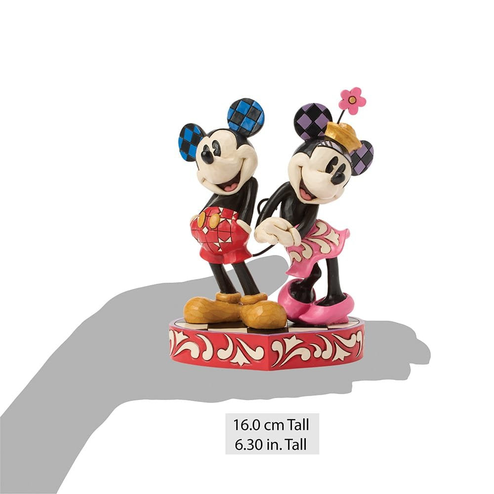 "Charmant Jim Shore miniatuur van Mickey en Minnie Mouse, perfect voor Disney-fans en verzamelaars, met handgeschilderde details."