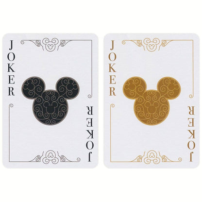 Close-up van kaart met goudfolie en Mickey Mouse detail.