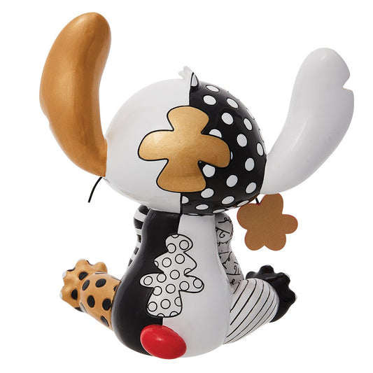 Exclusief Stitch decoratiebeeldje in een elegante goudkleurige afwerking, handbeschilderd en speels vormgegeven.