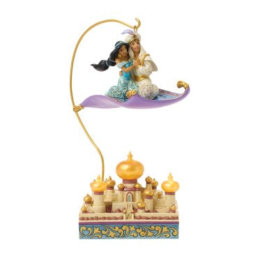 Laat je meevoeren door de magie van duizend-en-een-nacht met dit prachtige Disney Traditions beeldje van Jasmine en Aladdin. In de Magic in the Moonlight-uitvoering straalt dit beeldje pure romantiek uit, waarbij het zachte maanlicht en de sierlijke details het iconische liefdesverhaal op een betoverende manier vastleggen.

Ontworpen door Jim Shore, met zijn kenmerkende folkloristische patronen en ambachtelijke afwerking, is dit beeldje een elegante en tijdloze toevoeging aan elke Disney-collectie.