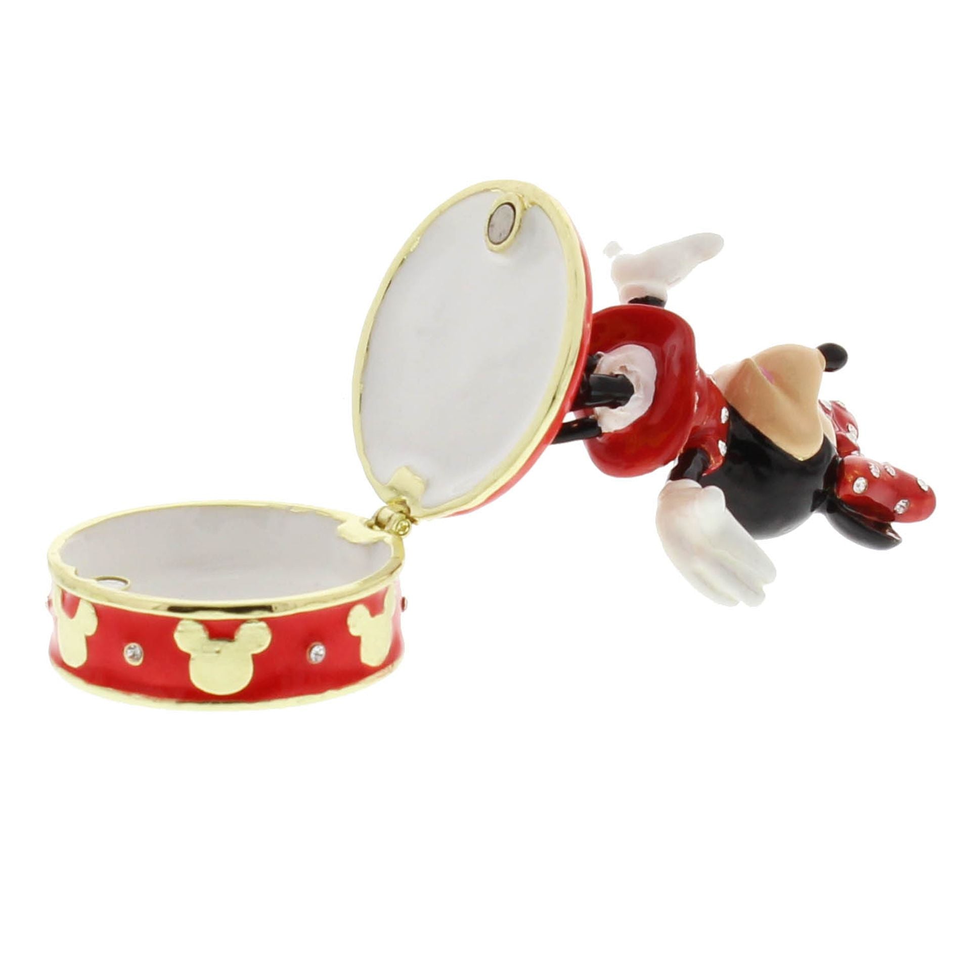 Geniet van de betoverende schoonheid van deze Minnie Mouse Trinket Box, afgewerkt met glinsterend kristal. Geleverd in een luxueuze doos met zijdevoering en kussen, allemaal versierd met het iconische Disney-logo