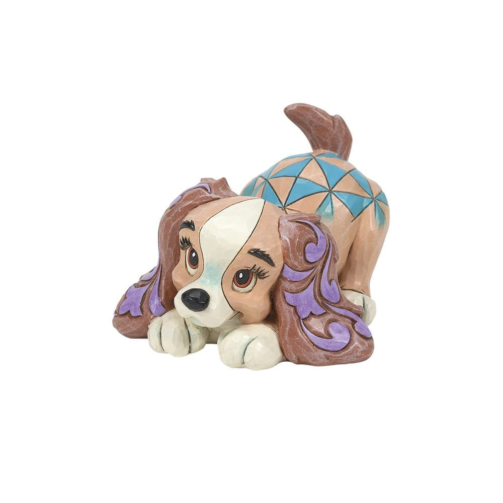 Mini-beeldje van Lady uit Lady en de Vagebond, ontworpen door Jim Shore voor de Disney Traditions-collectie.