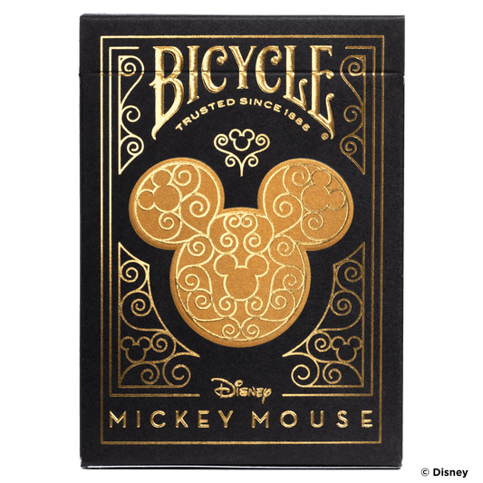 Speelkaarten met warme goudfolie en verborgen Mickey-details.