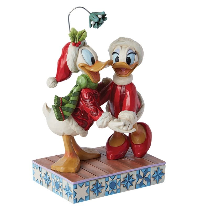 Disney Traditions-beeldje van Daisy en Donald Duck tijdens de feestdagen, perfect als cadeau of verzamelobject.