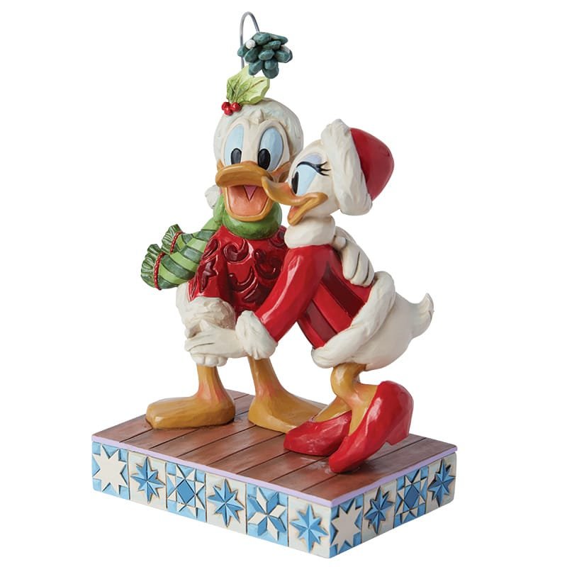Feestelijk Disney-beeldje van Daisy en Donald Duck, met oog voor detail en de kenmerkende charme van Jim Shore.