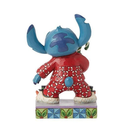Stitch in kerstsfeer met feestelijke pyjama, perfect als cadeau of voor je Disney-collectie.