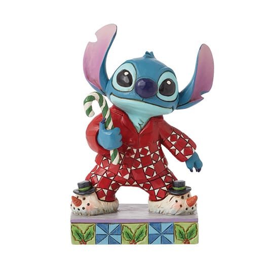 Schattig Stitch-beeldje in feestelijke pyjama, klaar voor kerstochtend uit de Disney Traditions-collectie van Jim Shore.