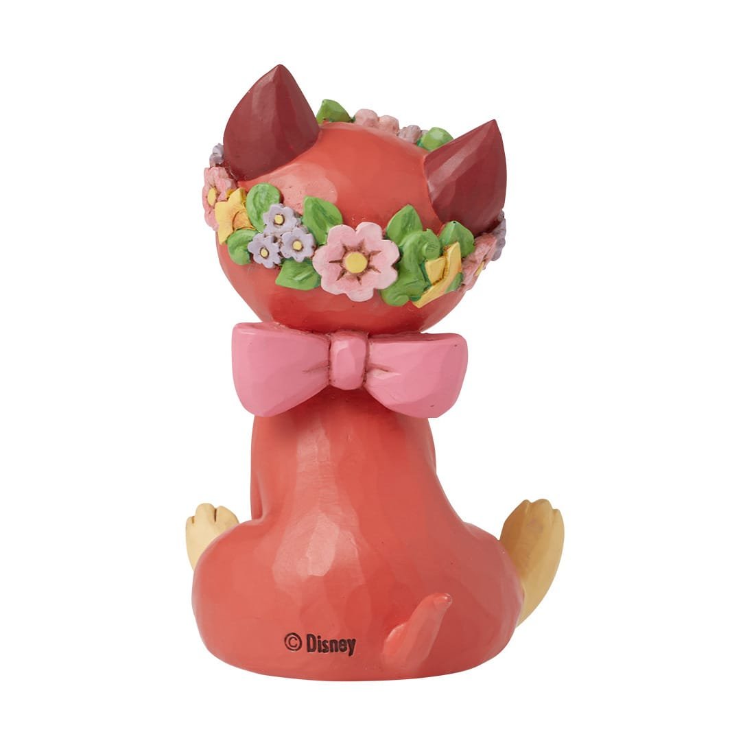 Kostbaar katje Dinah met bloemenkroon, ideaal als Disney-verzamelobject of cadeau voor kattenliefhebbers.