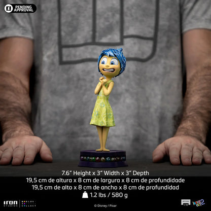Joy, de belichaming van geluk, gevangen in een handgeschilderde statue van Iron Studios – schaal 1/10.