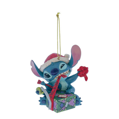 Schattige Stitch-hangornament voor kerst, vol opwinding terwijl hij zijn cadeau op kerstochtend opent – perfect voor Disney-fans en verzamelaars.
