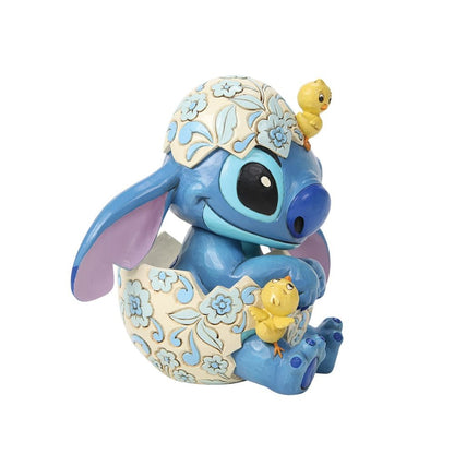 Schattig Disney Traditions Stitch met kuikens beeldje, paasthema figurine met kleurrijke Jim Shore afwerking.