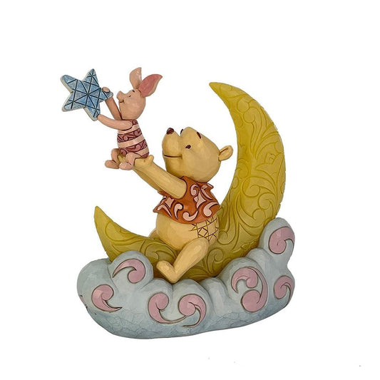 Disney Traditions Winnie the Pooh en Knorretje LED maan beeld van Jim Shore met zachte verlichting en dromerig ontwerp.