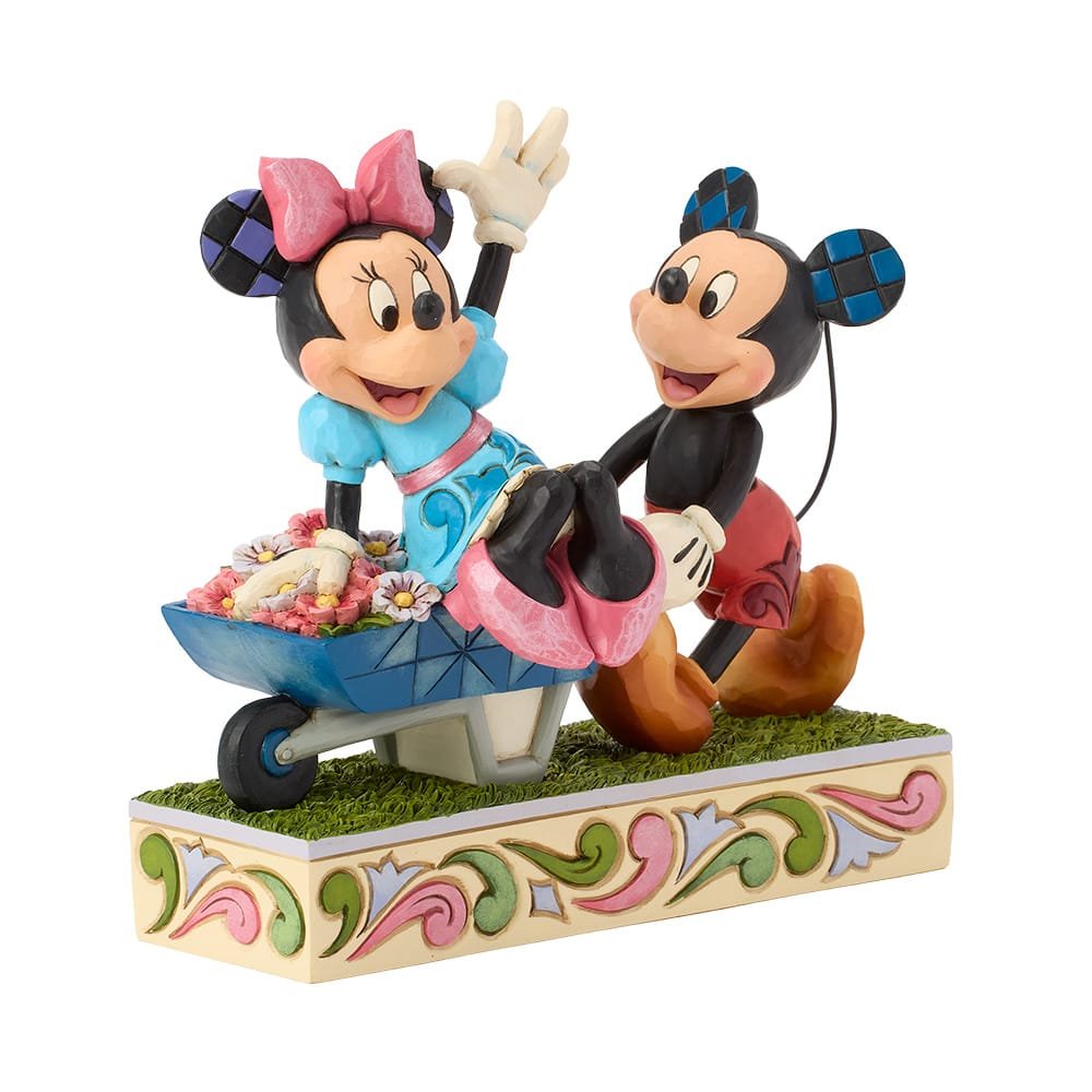 Romantisch Disney Traditions beeld van Mickey en Minnie Mouse in kruiwagen, gedetailleerde verzamel figurine.