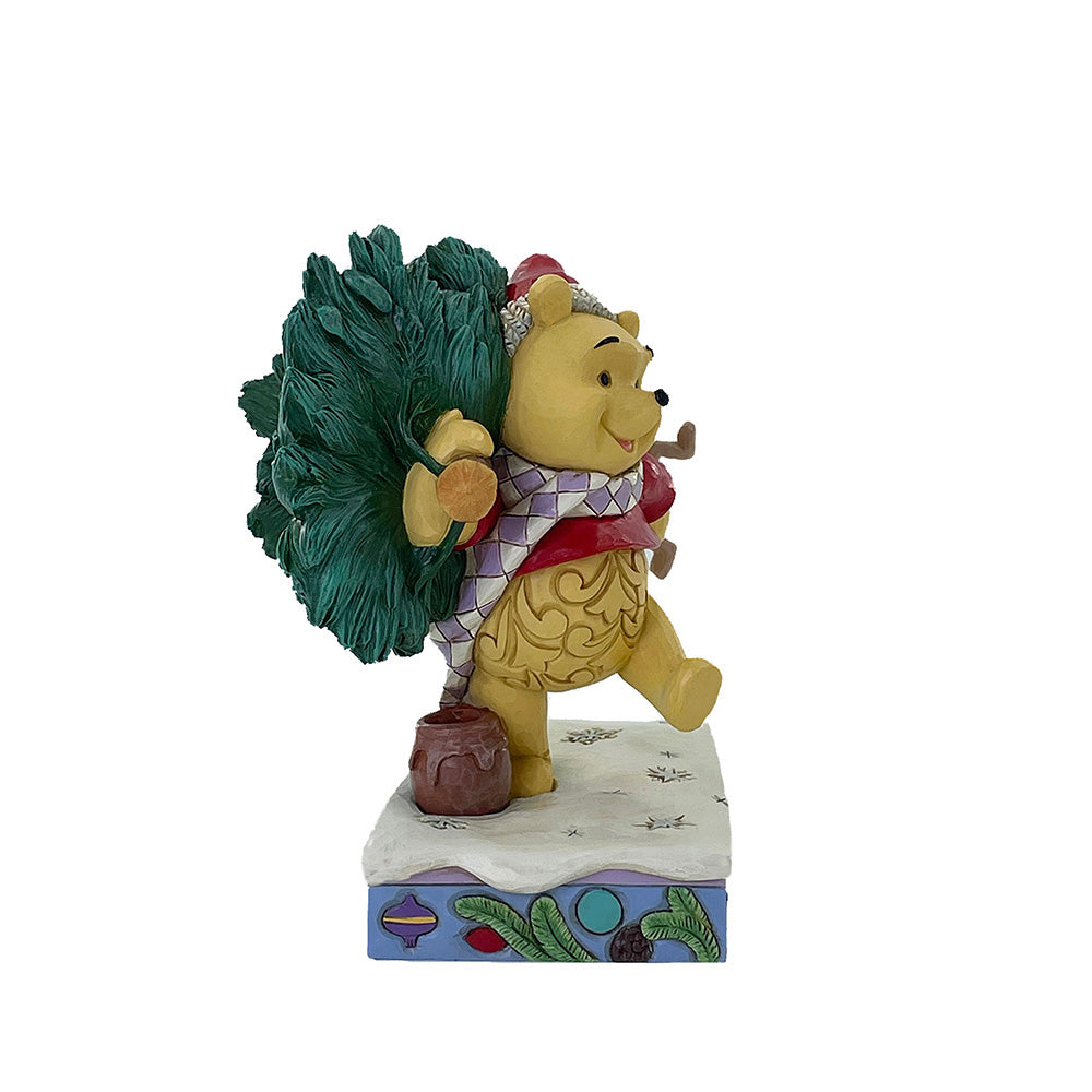 "Handbeschilderde resin figurine van Winnie de Poeh en Piglet uit de Disney Traditions collectie, met folk-art patronen en kerstthema."