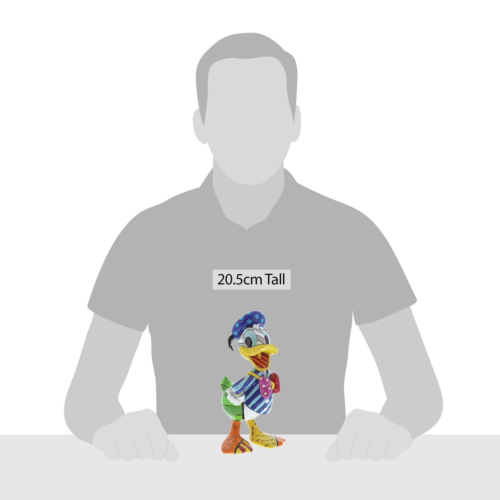 Romero Britto's kleurrijke Donald Duck beeldje, verpakt in een geschenkdoos – perfect voor Disney-verzamelaars.