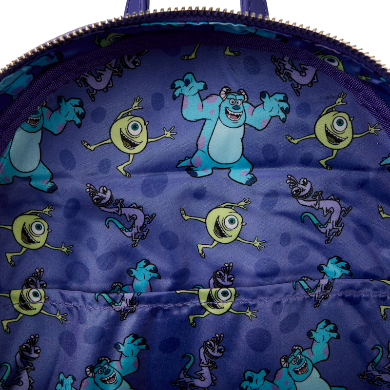 Binnenkant van de rugzak met bijpassende Monsters, Inc.-thema voering.